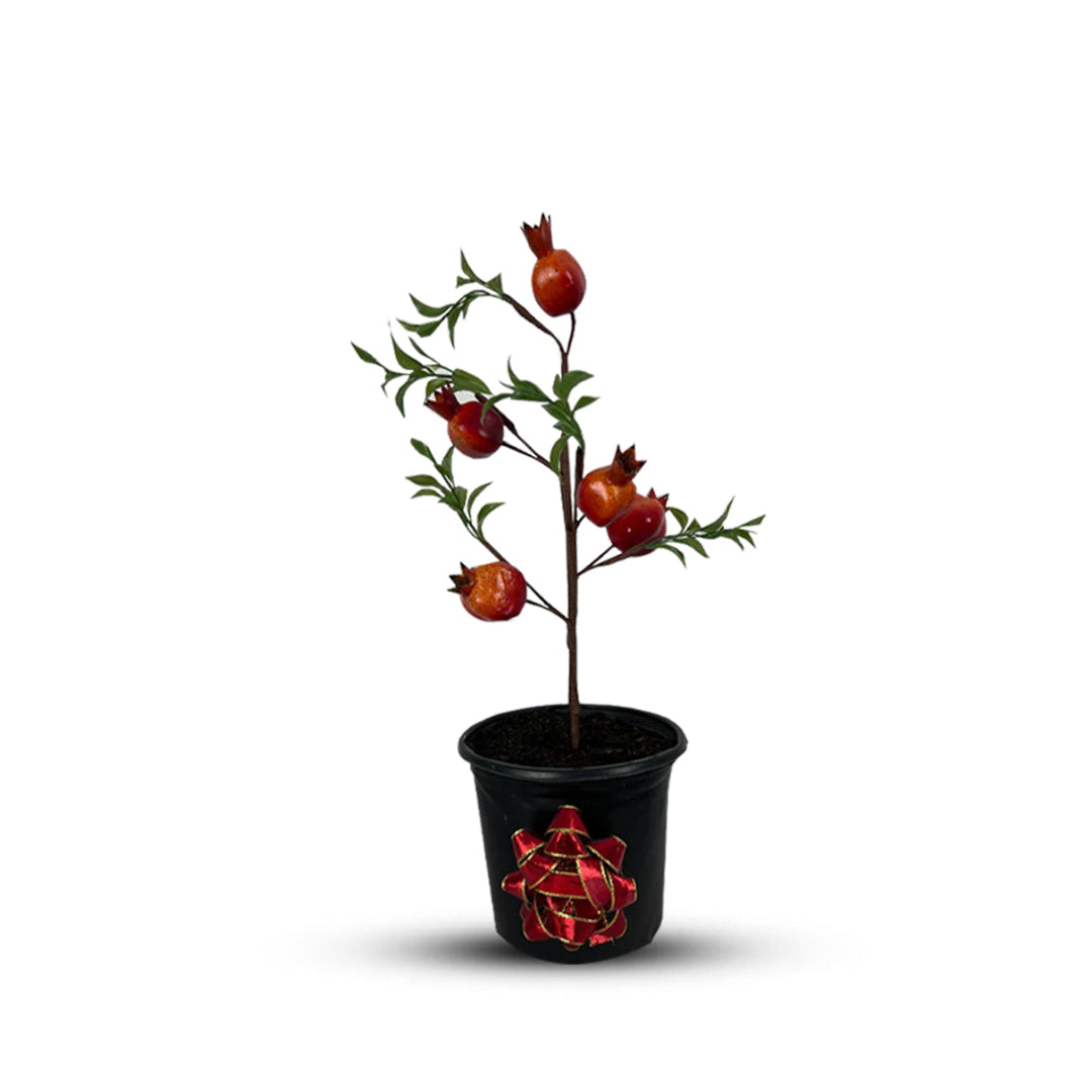 Artificial pomegranate bonsai with realistic red fruits in decorative pot
