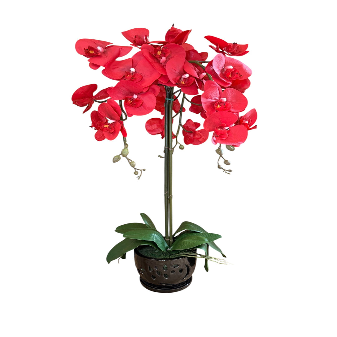 Faux red orchid with detailed petals and natural looking stems