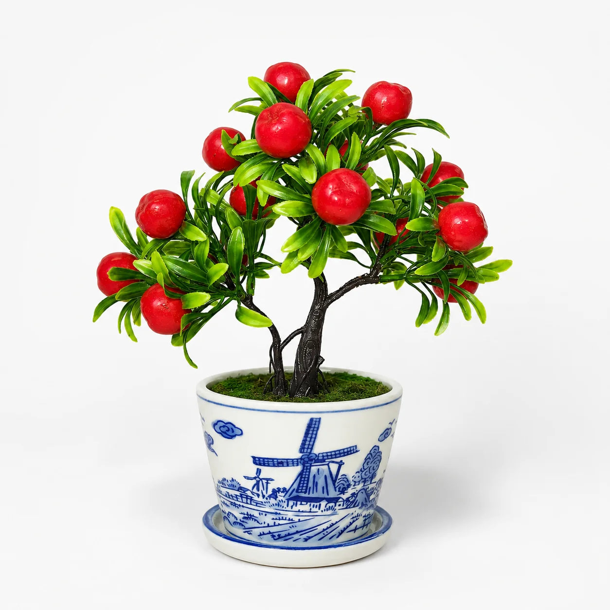 Artificial mini apple bonsai in a blue and white ceramic planter.